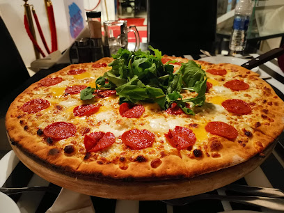 Volare Pizzeria مطعم فولاري بزيريا - مسقط - +968 24 601310