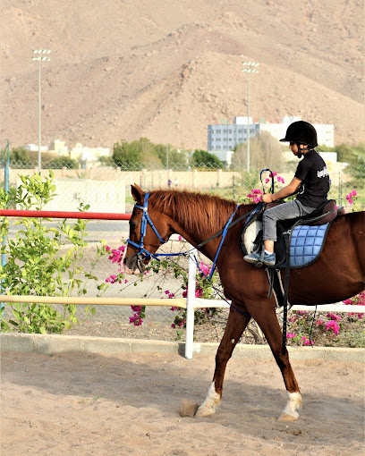 مدرسة البيان لتعليم الفروسية بنادي نزوى مدرسة البيان لتعليم الفروسية بنادي نزوى - Oman|Nizwa|Unnamed Road|WG7C+GX2
